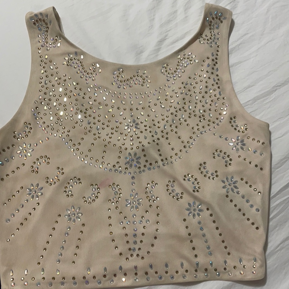 Tops beich de con Brillo tiene una puesta nada mas esta nuevo